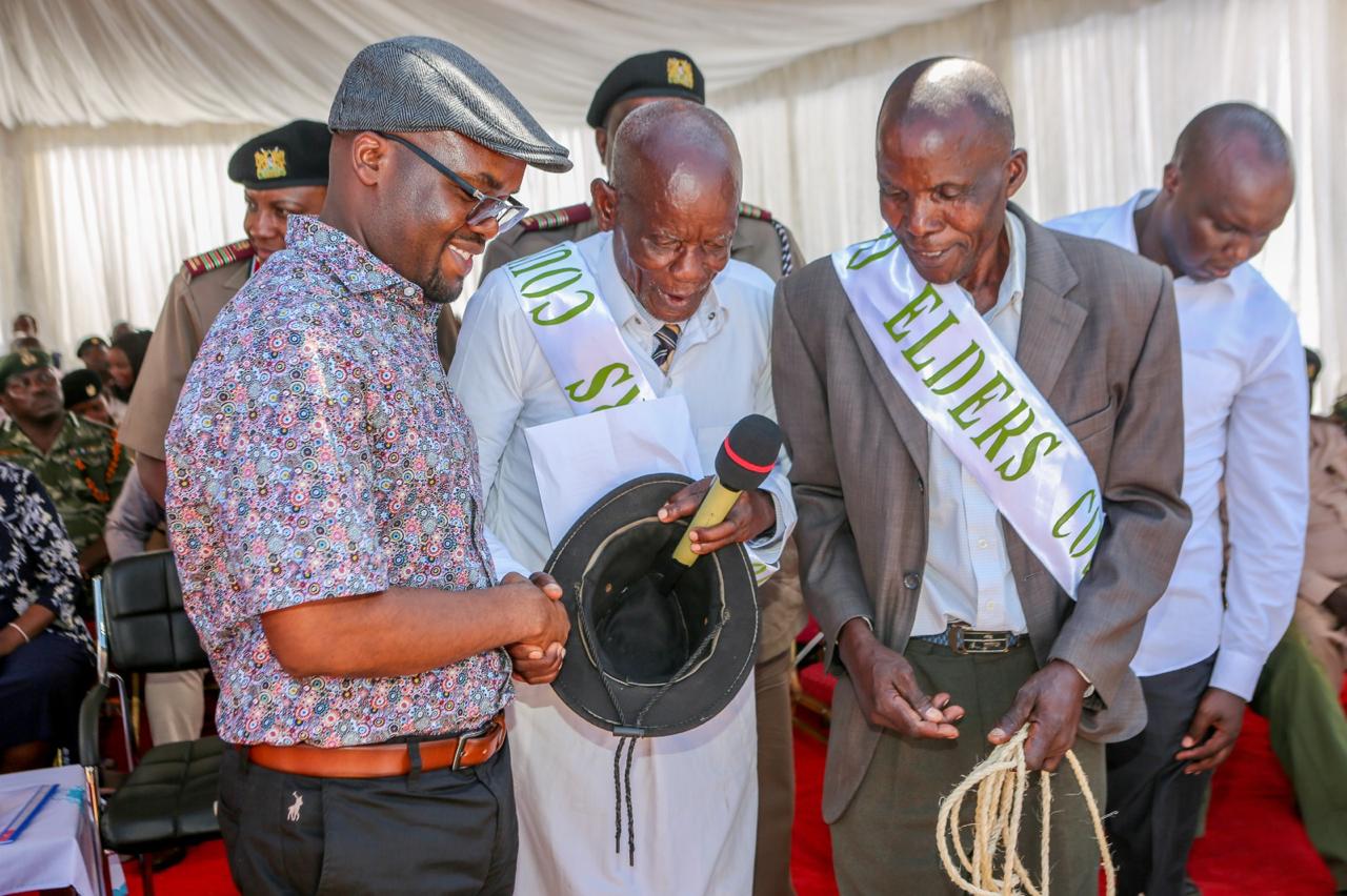 PS Dr. Raymond Omollo engages village elders